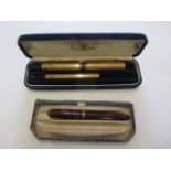 A Conway Stewart Dinkie 550 fountain pen plunger seized, some wear and a watermans gold plated