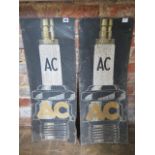 Automobilia: Two polychrome painted tin advertising signs for AC Spark plugs, 81.5cm x 32cm. Both