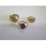 Three 9ct gold rings, one has been cut, total weight approx 9.3 grams