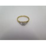 An 18ct yellow gold diamond flower ring, illusion set, size P, approx 2.5grams in good condition