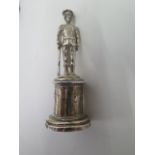 A silver soldier on stand, 9cm tall, approx 1.5 troy oz