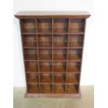 A mahogany set of 24 pigeon holes, 99cm tall x 69cm x 19cm