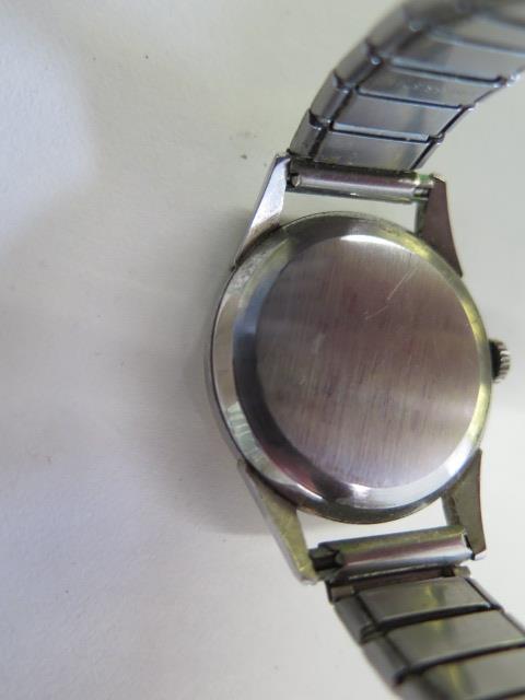 A Longines manual wind gents wristwatch, case 34mm wide, running in saleroom, some wear and spotting - Image 3 of 4