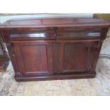 A 19th century flame mahogany side cabinet with 2 drawers over 2 cupboard doors, 140cm width x