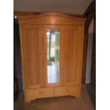 A 19th century continental triple wardrobe ,can be dismantled for easy movement, in good