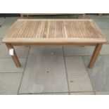 A boxed teak coffee table, new and boxed, 120cm x 60cm