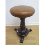 A 19th century Rosewood piano stool, 49cm tall, restored and recovered.