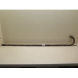 A cane horse measure walking cane with silver fitting, London 1904/5 R.W, 95cm long, missing base