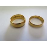 Two 22ct yellow gold band rings, sizes J, approx 10.3 grams, some minor wear