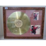 A Paul McCartney gold disc choba b CCCP - Back in the USSR, dated 1989, in a burr wood effect frame,