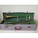 An Emperor Trombone by Boosey and Hawker with case and cones, in reasonably good condition