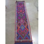 A hand knotted woollen Suzni Kilim runner, 263cm x 65cm