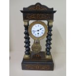 A French 8 day empire mantle clock, 48cm tall, running in saleroom