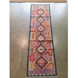 A hand knotted woollen chobi kilim runner, 203cm x 59cm