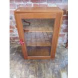 A hardwood display cabinet with a key, 77cm x 51cm x 23cm