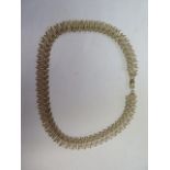 A 9ct hallmarked yellow gold textured link necklace, 42cm long, approx 22.6 grams, in good condition