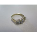 A hallmarked aquamarine and 9ct gold five stone ring, overall approx weight 2.8 grams, size S, minor