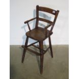 A Victorian child's elm high chair, 80cm tall in good polished condition