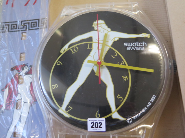 A Maxi Swatch wallclock 1991 in original box, box is 100cm long, clock in original packing, some - Image 2 of 3