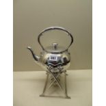 A late Victorian silver plated spirit kettle by James Dixon, 30cm tall, some marks but in polished