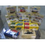 A collection of 10 boxed Corgi trams and a bus, 3 vanguards trucks and 2 others all vehicles in