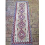 A new hand knotted woollen Chobi Kilim runner, 1.93m x 0.62m