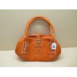 A Loewe leather senda tangerine handbag with booklet and barcode, 33cm wide, in generally good
