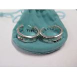 A pair of Tiffany & Co silver hoop earrings, stamped '.925 T & Co 1837' weight approx 13.8 grams,