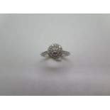 A 9ct white gold cluster diamond ring, size L, approx 3.1 grams, diamonds approx 0.29ct marked 9ct
