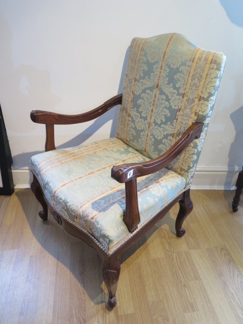 A mahogany upholstered open chair, 94cm tall x 64cm wide x 60cm deep, in good condition