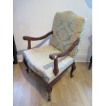 A mahogany upholstered open chair, 94cm tall x 64cm wide x 60cm deep, in good condition