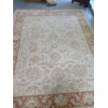 A hand knotted woollen Persian Ziegler rug with foliate border, 3m x 2.4m, general wear with some
