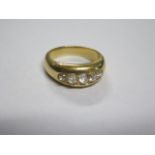 A yellow gold 5 stone diamond ring, not hallmarked, but tests to approx 18ct, central diamond approx