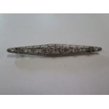 A continental yellow gold and diamond set brooch with white metal setting, 7cm long and the