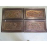 A group of four Art Nouveau 'bronzed' card plaques decorated in relief with allegorical figures