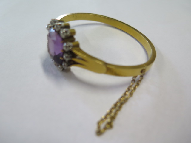 An impressive continental gold Amethyst and diamond hinged bangle, the central Amethyst is approx - Image 3 of 3