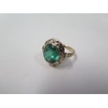 A 9ct yellow gold Edwardian oval green stone ring, marked 9ct, size M, approx 4.6 grams, in good