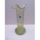 A Loetz style glass sleeve vase with green trailing decoration and frilled rim