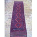 A new hand knotted woollen Meshwani runner, 2.3m x 0.66m