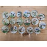 A collection of 17 Chinese glass paperweights ranging from 6 to 7cm, all generally good with some