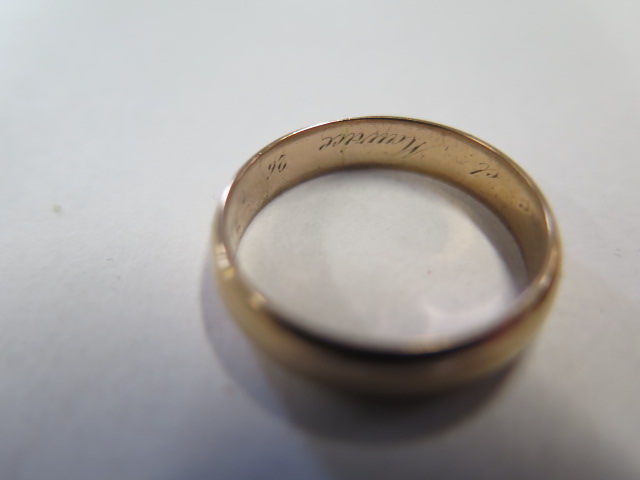 Two yellow gold band rings unhallmarked but test to approx 18ct, sizes T and Q, on has internal - Image 3 of 3