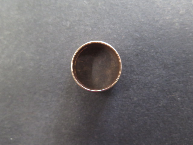 A hallmarked 9ct yellow gold band ring, size Q, 8mm deep, approx 7.8 grams, some usage marks but - Image 2 of 2