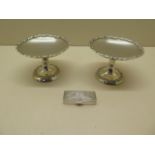 A pair of silver sweetmeat dishes on stands and a small pill box, total weight approx 4.9 troy oz