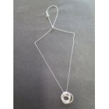 A Tiffany and Co .925 sterling silver interlocking circles pendant and chain, hallmarked '925 T & Co