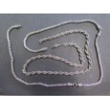 Two white metal chains, one broken the other needing a clasp, total weight approx 3.7 troy oz