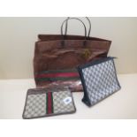 Two Gucci zip bags and a carrier bag, 24cm and 26cm wide, zip bags generally good although one zip