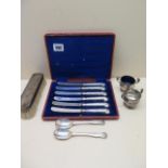 A set of six silver handled butter knives, cased, and mixed silver wares, dents and tarnishing and