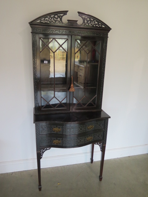 An Edwardian mahogany bookcase top 2 drawer side table with blind fretwork decoration, 178cm tall