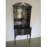 An Edwardian mahogany bookcase top 2 drawer side table with blind fretwork decoration, 178cm tall