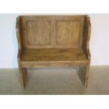 A rustic pine hall bench, 92cm tall x 91cm x 40cm